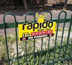 Branded no parking advertising board on a society gate in Pune