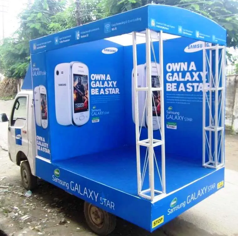 Branded mobile van advertising on the streets of Chennai with crowd engagement