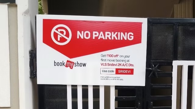 Branded no parking advertising board on a society gate in Jaipur