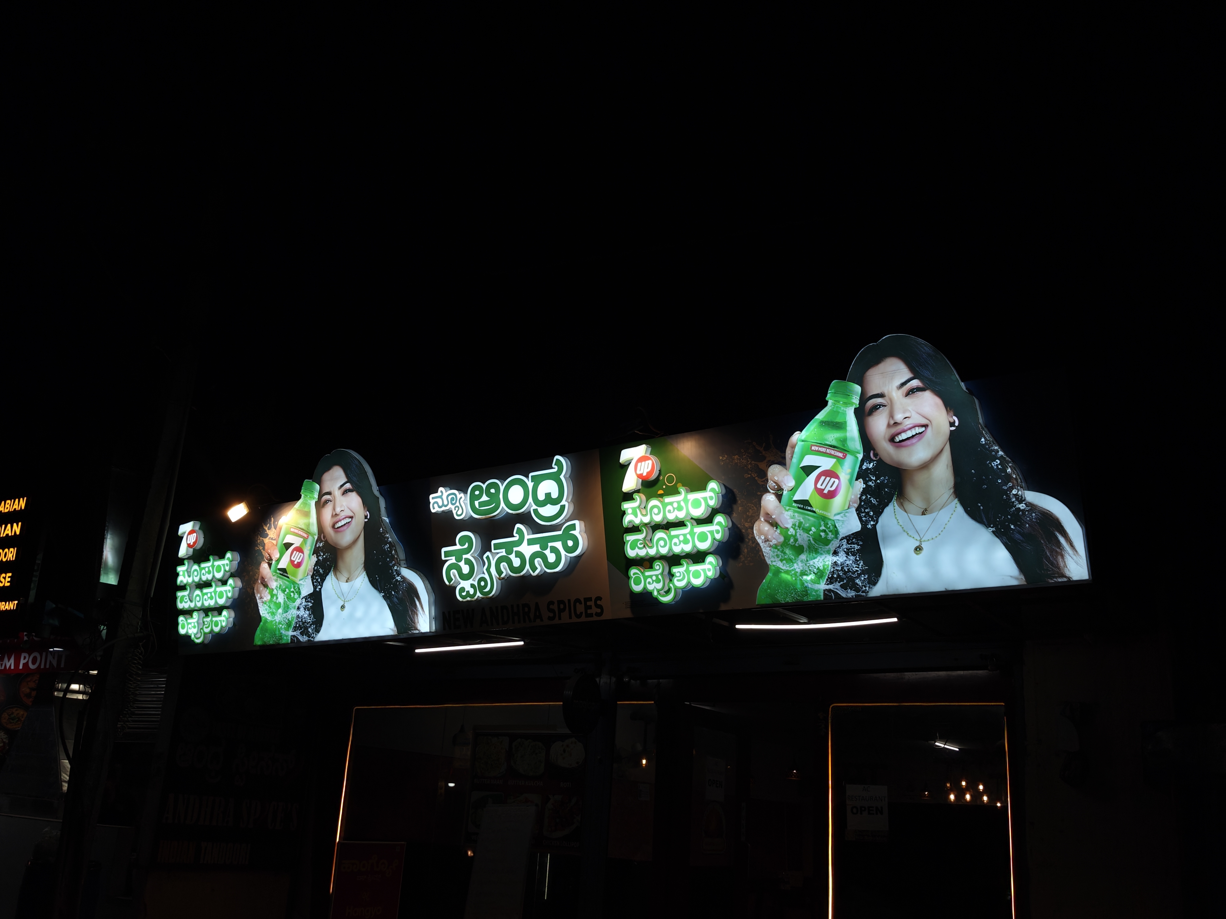 Illuminated ACP and LED shop name board with Gujarati lettering on an Ahmedabad market storefront installed by The Mediaverse