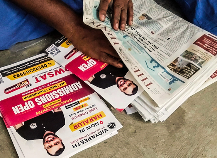 Newspaper insertion service in Bangalore distributing advertising pamphlets across apartments and gated communities at scale